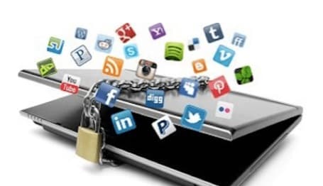 Representation of Digital Assets showing a laptop locked with social app icons floating around it