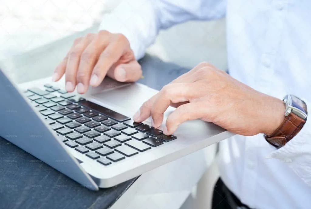 Man-at-computer-to-write-his-own-will-1024×690-1 Man is going to write his own will online.