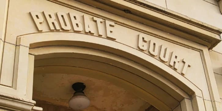 Are Wills Public Record An arched stone entryway to a building with the words "Probate Court" engraved above the door