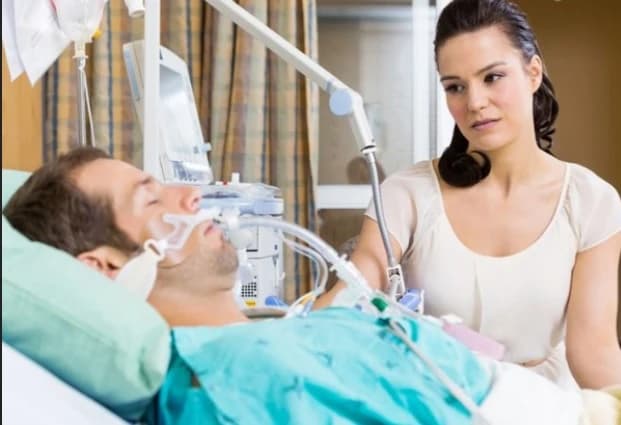 Why-you-need-an-Advance-Directive Man in hospital critical condition with wife