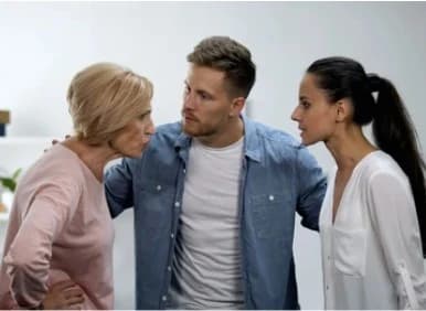 Family Tension During an Inheritance Dispute A family arguing face-to-face during an inheritance dispute over property and final wishes.